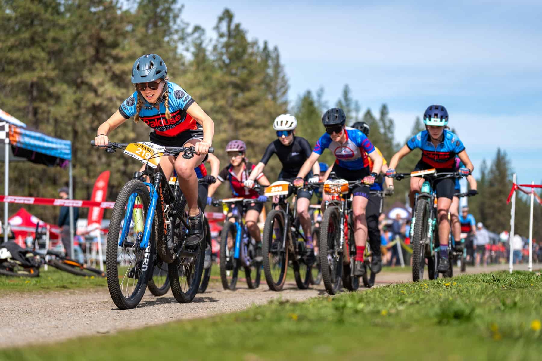 Palouse Composite rider leading the pack off the start line at Riverside Rampage, 2026